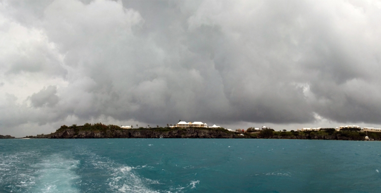 A storm on the horizon. A panoramic view of the site, taken as we leave quickly, hoping to avoid being caught in rough seas. - © 2012 Warwick Project